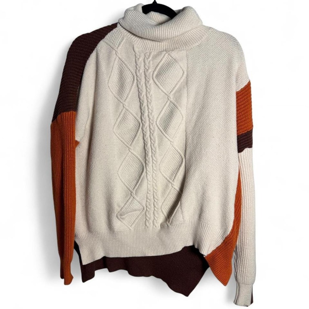 Multicolored knitted turtleneck sweater. Most likely a size‎ medium or large